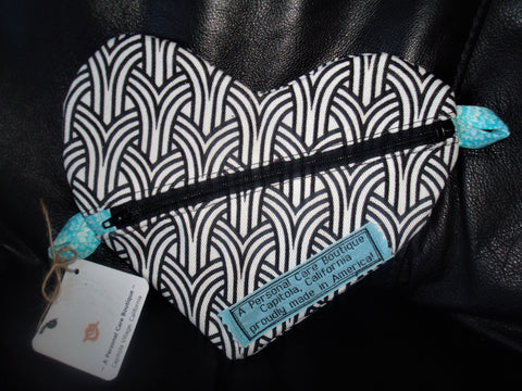 A Personal Care Boutique heart zipper pouch black and white front