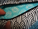 A Personal Care Boutique heart zipper pouch black and white, turquoise lined
